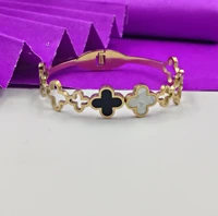 crazyhoor Golden And White Clover Plated Stainless Steel Bangle-Style Bracelet